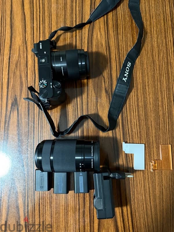 Sony Alpha a6000 Mirrorless Digital Camera with 50mm 1.8 & 55-210mm 4