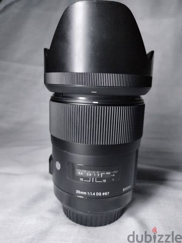 Lens 35 sigma art for canon as new  with box 1