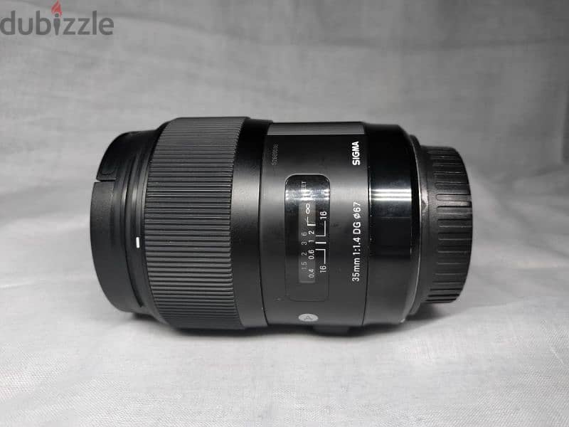 Lens 35 sigma art for canon as new  with box 4