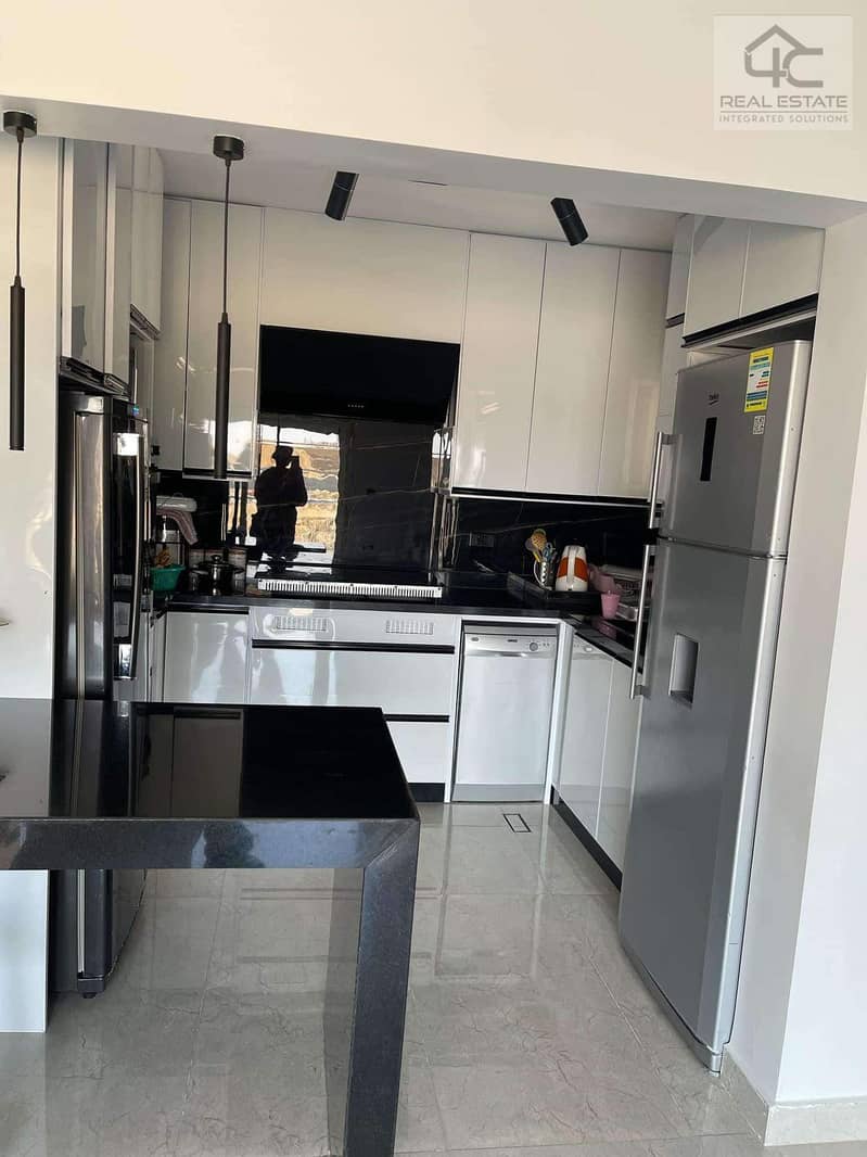 For sale apartment 130m fully finished with kitchen and dressing with installments and the lowest price in Mountain View iCity in Fifth Settlement 1