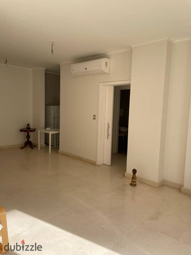 lowest price semi Furnished studio for sale Village Gate New Cairo 0