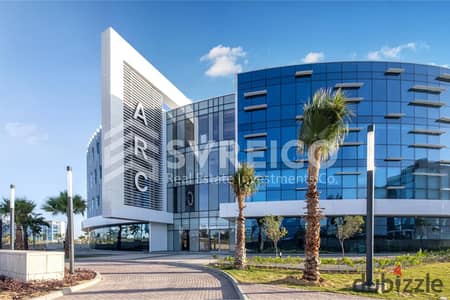 Administrative office for rent, finished, 74 meters, with a distinctive layout, in the Smart Village, near Sheikh Zayed, on the desert road