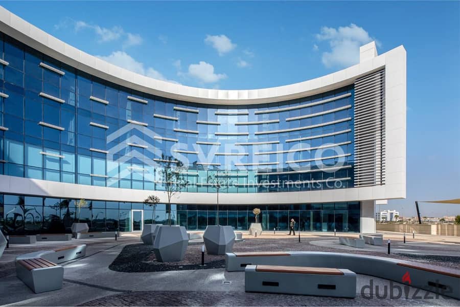 Administrative office for rent, finished, 74 meters, with a distinctive layout, in the Smart Village, near Sheikh Zayed, on the desert road 5