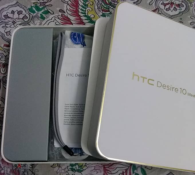 موبايل htc Desire 10 lifestyle بالكرتونة وكل مشتملاته وجراب مستورد 3