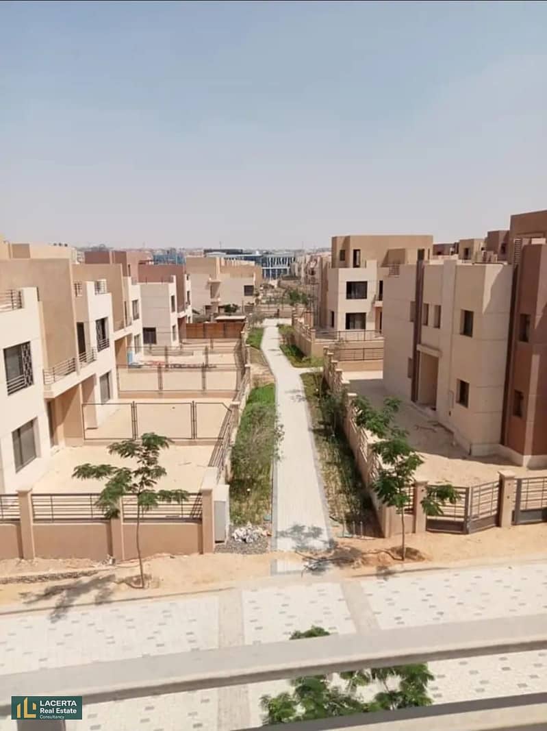 At the first offering price in Sheikh Zayed, a townhouse villa with a lagoon view for sale in IWAN, Iwan, in front of Solana West, 5