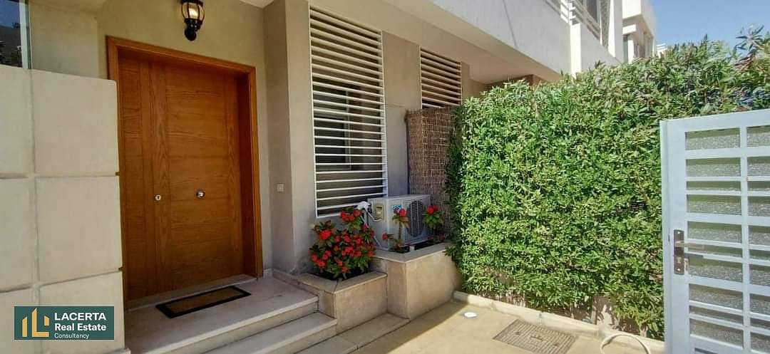 At the first offering price in Sheikh Zayed, a townhouse villa with a lagoon view for sale in IWAN, Iwan, in front of Solana West, 6