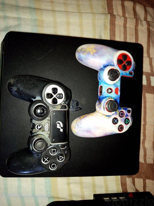 PS4 + 3 games + 2 controllers 1