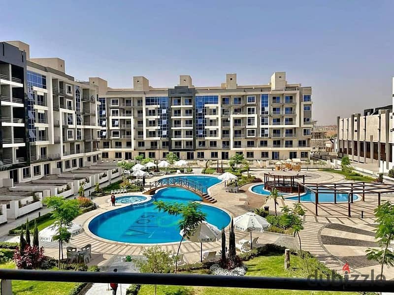 **Apartment with a garden for sale near City Centre Almaza, in Isola Sheraton compound (ISOLA SHERATON). ** 0