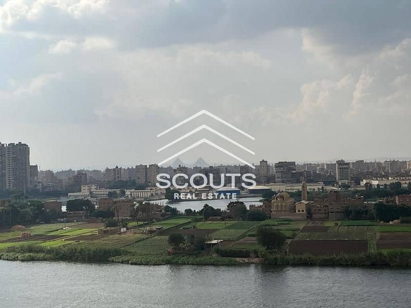 Hotel apartment on the Nile Corniche, fully finished with air conditioners, appliances and kitchen in Nile Pearl Towers Maadi 0