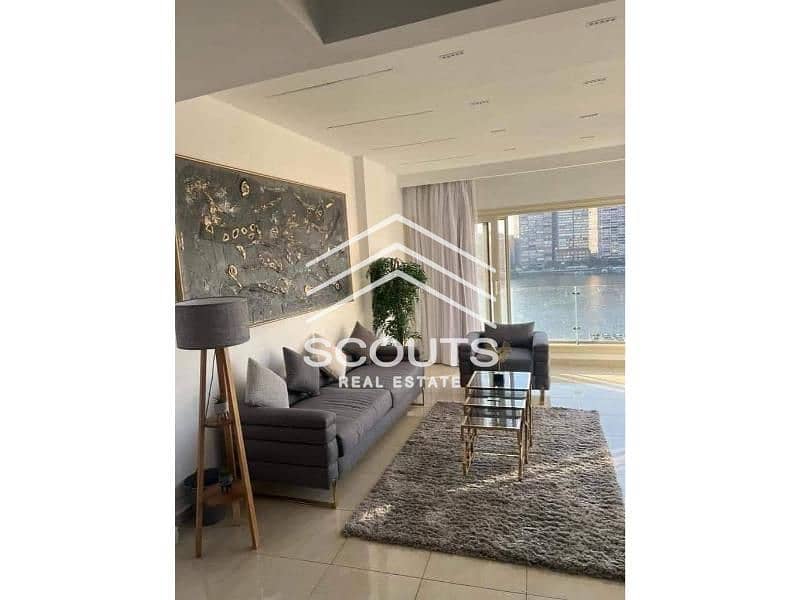 Fully finished apartment with furniture, appliances and air conditioners on the Maadi Corniche on the Nile for quick sale in Reve Tunnel, minutes from 0