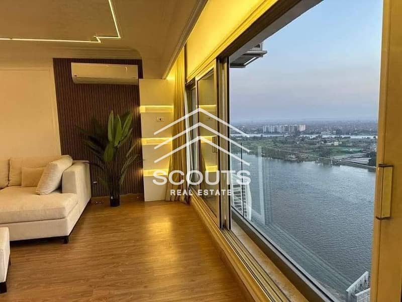 Apartment for sale in Reve du Nil Towers, Maadi, delivery in months, in installments 0