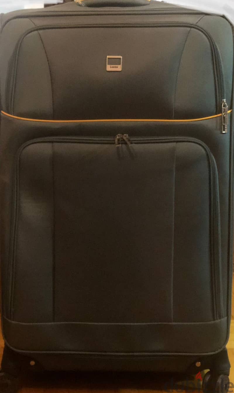 2 Lucas luggages /   شنطين سفر حجم كبير وارد امريكا ماركة لوكس 2