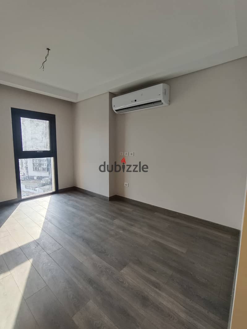 Apartment for rent in Zed Towers, 135 m, Sheikh Zayed - kitchen with appliances and air conditioners 0