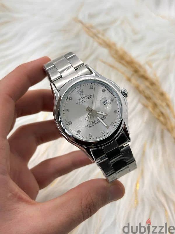 ساعات Toomy Hilfiger و Emporio Armani و Rolex 8