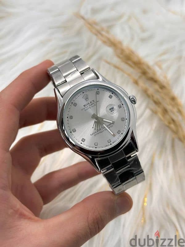 ساعات Toomy Hilfiger و Emporio Armani و Rolex 12