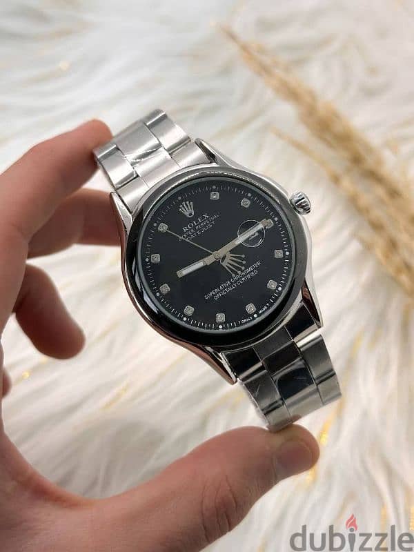 ساعات Toomy Hilfiger و Emporio Armani و Rolex 16