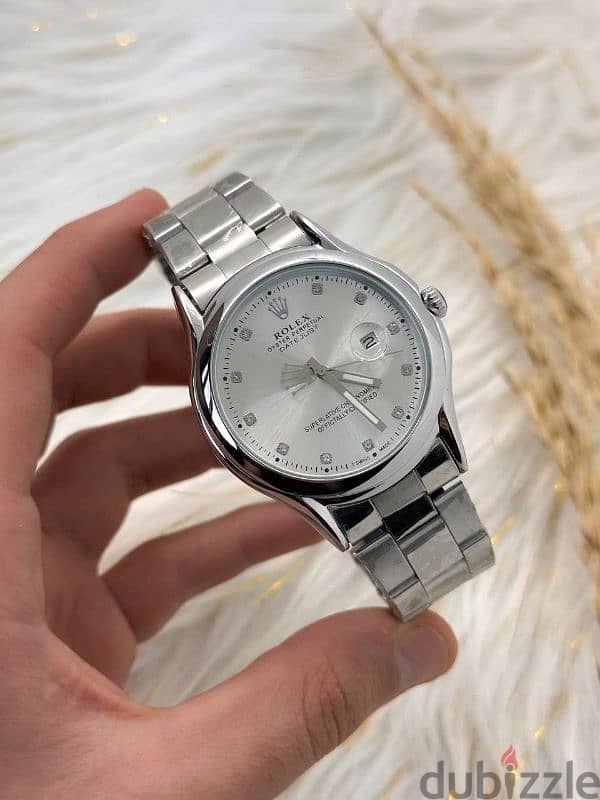 ساعات Toomy Hilfiger و Emporio Armani و Rolex 17