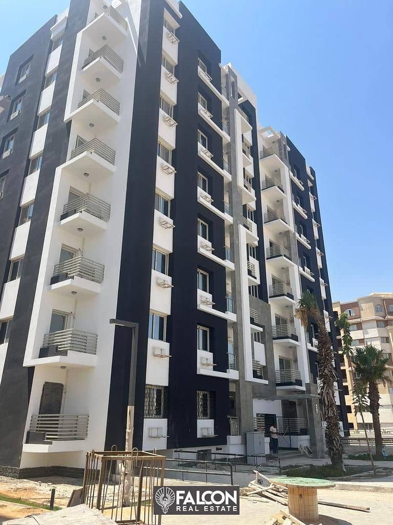 Double view of iconic tower and garden Ready To Move a finished apartment with installments up to 10 years in Al Maqsad Compound in New Capital 10