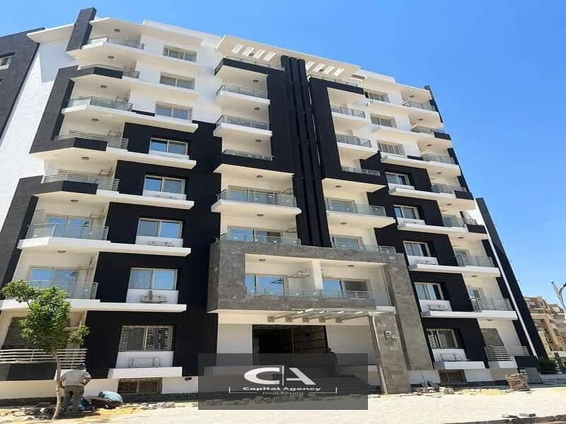 Two-room apartment for sale ready to move with only 5% down payment prime location in front of the iconic tower in al maqsad compound 16