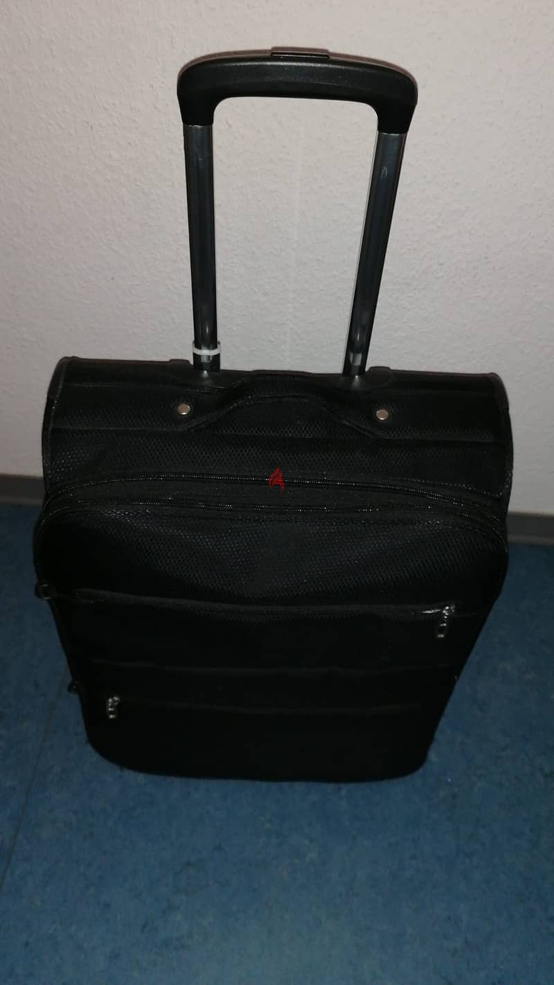 شنطة سفر صغيرة من الخارج black cabin bag 1