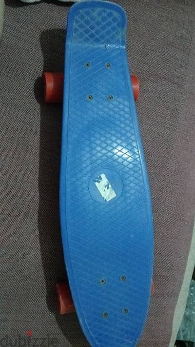 penny skate board ازرق