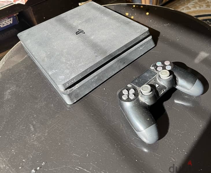 Playstation 4 slim 1 TB 0