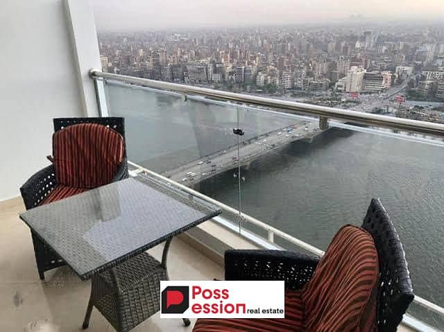 Apartment for sale on the Nile, furnished with Acs, with a panoramic view on Dahab Island, next to the Hilton Maadi Hotel with 5 years installments 0