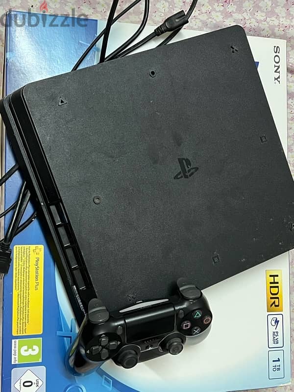 ps4 slim 1TB with some games 1