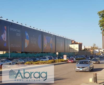 For sale with facilities, a 57-meter clinic, fully finished, to be delivered in 6 months, with a view of Al-Bustan Street, in front of Capital Busines