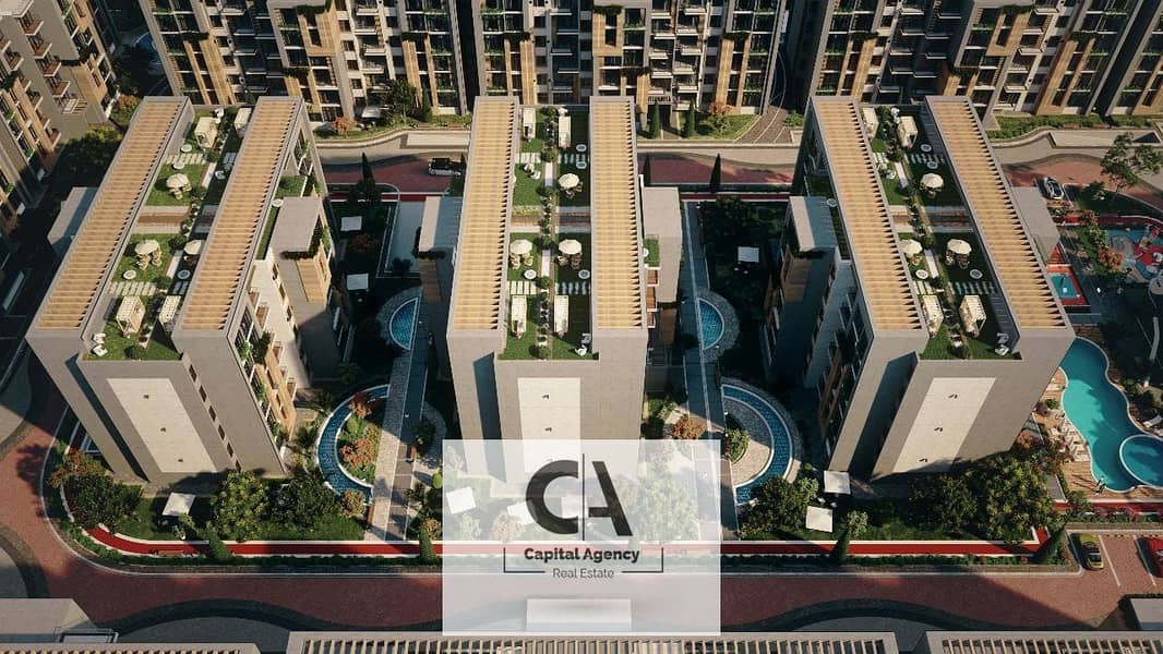 Apartment for sale with a private roof without 0% down payment in the heart of the Fifth Settlement in Valencia Compound, with equal installments 0