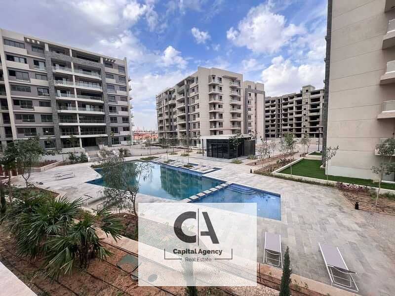 ready to move Apartment for sale without 0% down payment ground floor garden  in the heart of new capital with Misr Italia IL Bosco 0