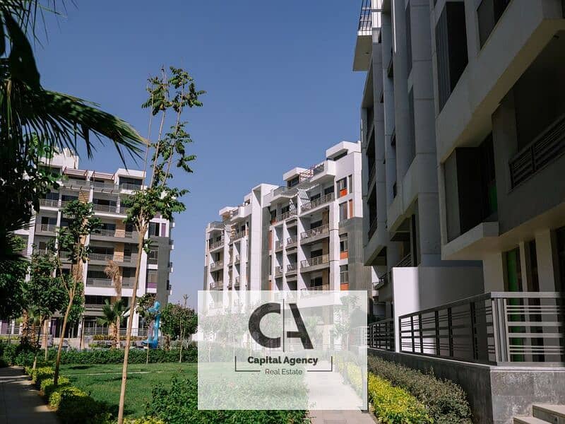 Apartment for sale in the Fifth Settlement with a 30% cash discount in Golden Square - Icon Gardens Compound | 15% down payment * Icon Gardens * 0