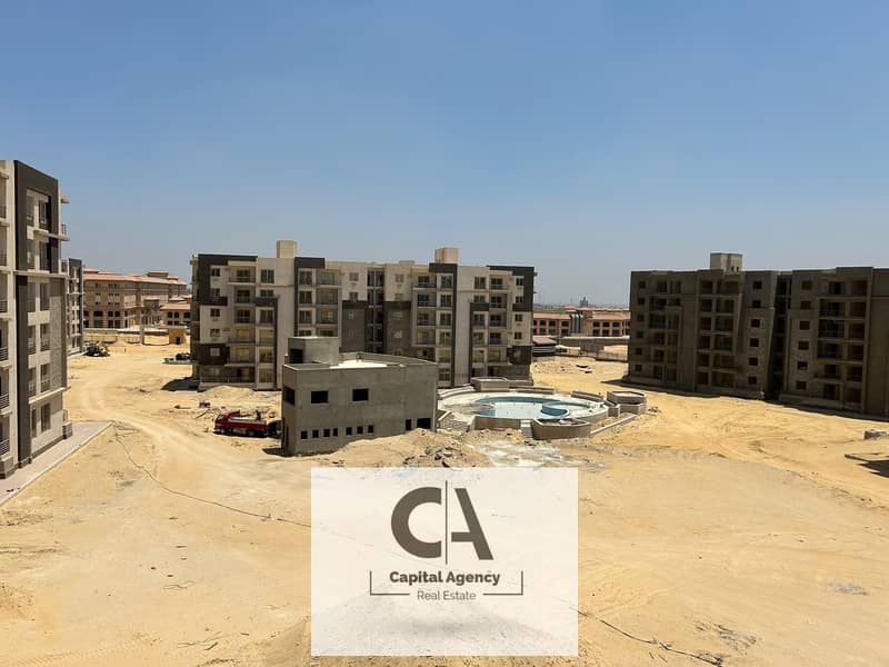 Fully finished apartment in the heart of Sheikh Zayed for sale, delivery 2025 - with down payment and equal installments in _ Bliss Gate 0