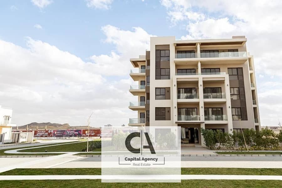 Own an apartment with a 15% down payment fully finished delivery in 18 months installments up to 7 years in the heart of Sheikh Zayed in _ Bliss Gate 0