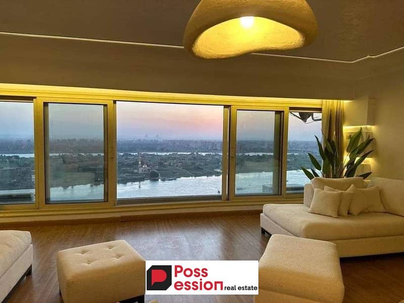 Hotel apartment for sale on the Nile directly next to Hilton Maadi, immediate delivery in installments, finished with furniture, appliances and air co 0