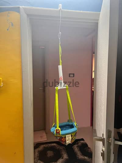 swing for the baby that can be hanged on the door frame