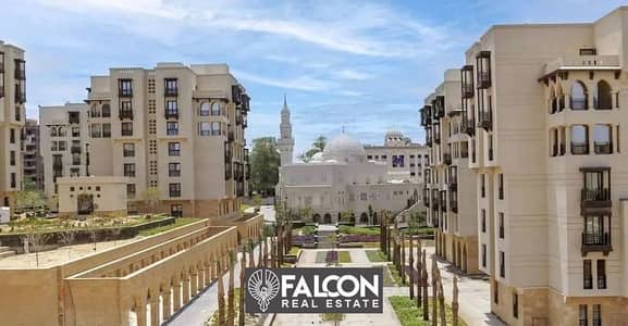 For sale, an apartment with immediate receipt in the Fustat compound, fully finished, next to the wall of Majra Al-Oyoun, in installments over 12 year