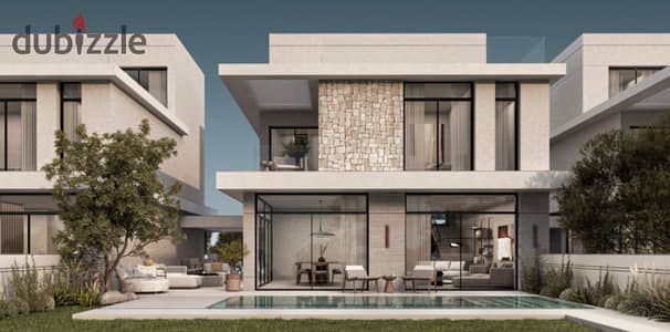 Live in a finished villa with a landscape view next to SODIC, with installments over 9 years, in Sheikh Zayed