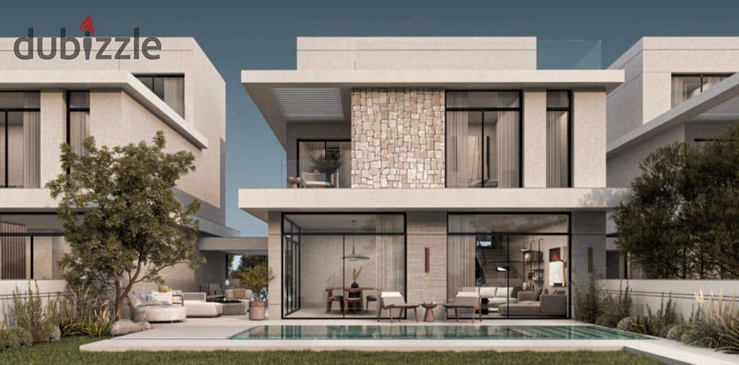 Live in a finished villa with a landscape view next to SODIC, with installments over 9 years, in Sheikh Zayed 0