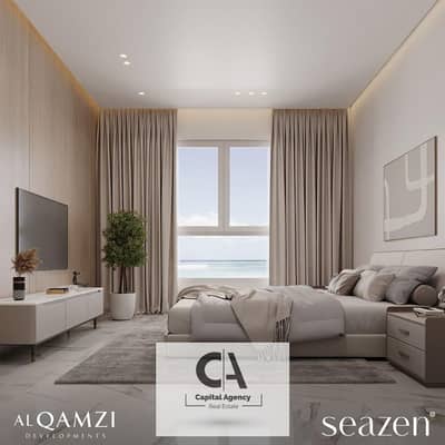 Own a chalet with a 24% discount on cash, fully finished, with kitchen and air conditioners_in the North Coast_Al Qamzi | Seazen