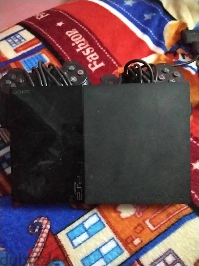 PlayStation 2 مستعمل محتاج تصليح مكان الcd 0