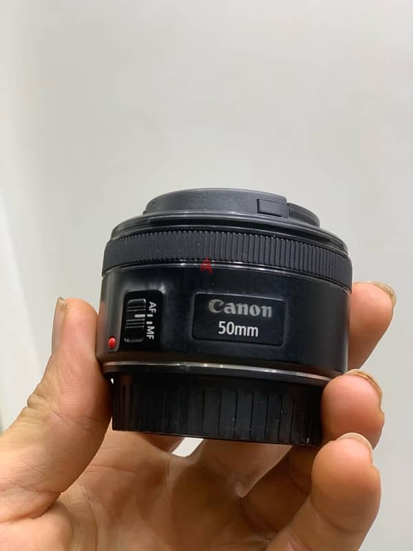 lens 50stm  بحالة الزيرو 0