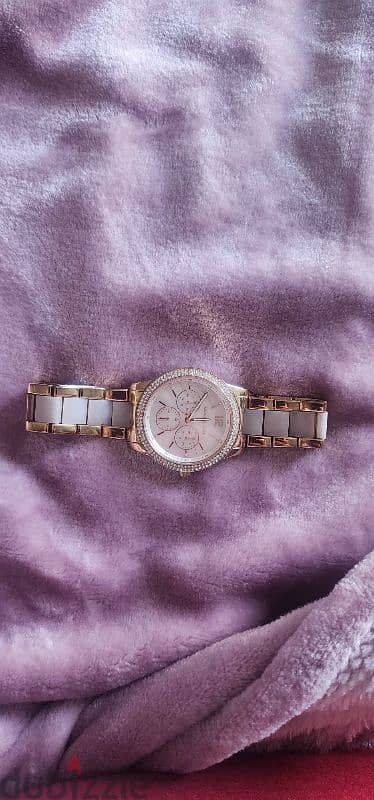 genuine MK female rose gold watch with the box