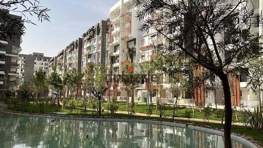 A ready-to-move-in apartment with full finishing, air conditioners, and a kitchen in **R7** at La Capital Compound, New Capital (LA CAPITAL )