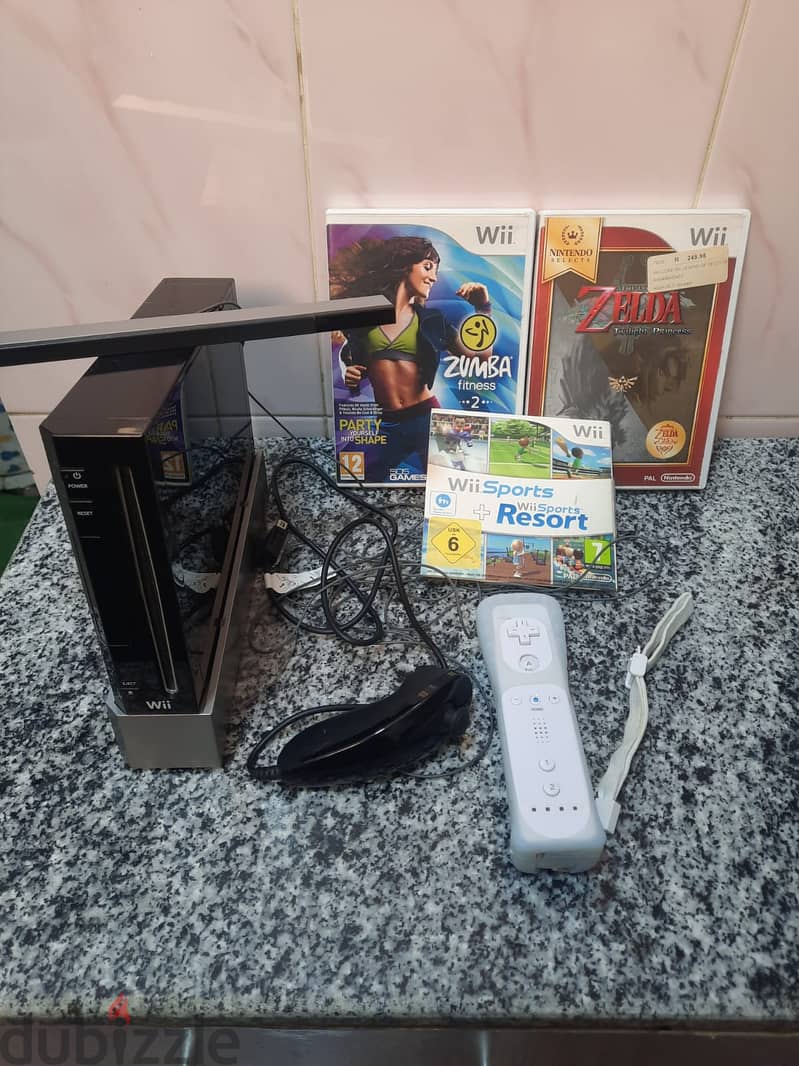 Nintendo wii + 2 games 0