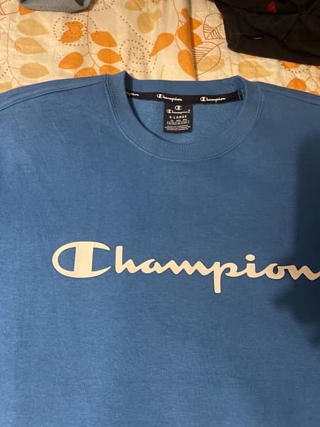 سويتشيرت champion مقاس اكس لارج ، اصلي ١٠٠٪؜ و  حالته جديدة 1