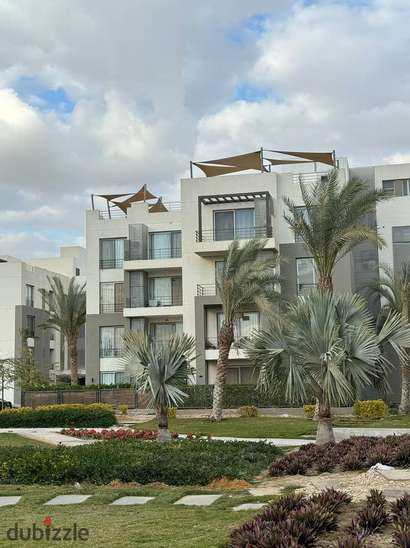 شقة بجاردن متشطبة مساحة كبيرة في بالم باركس - palm parks شركة بالم هيلز بالتقسيط 0