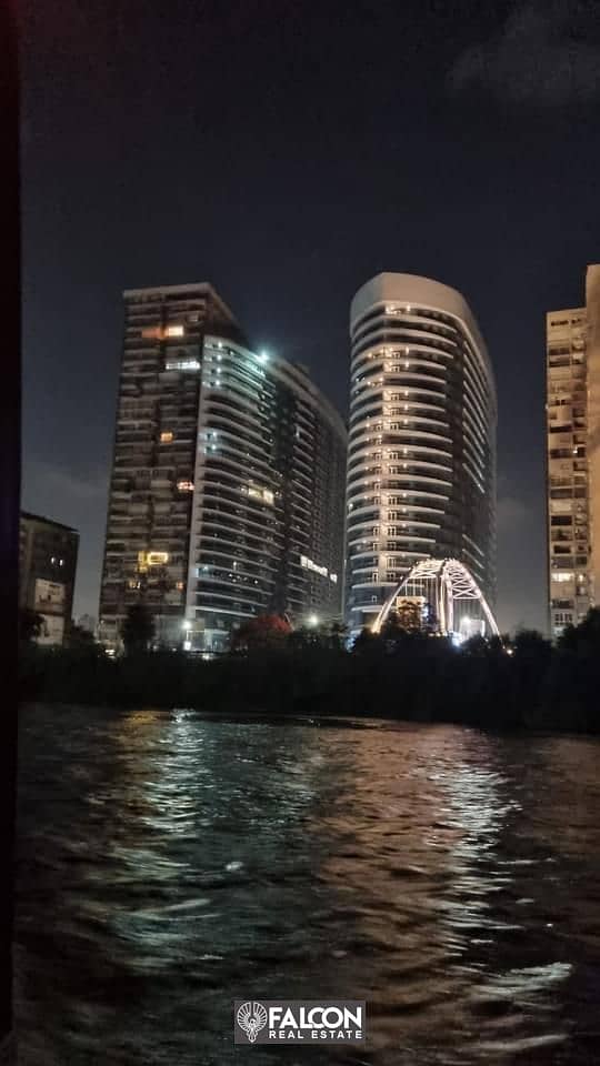 استلم فوري شقة فندقية بتشطيب كامل وإطلالة بانورامية على النيل مباشره في ابراج نايل بيرل Nile Pearl Towers بالتقسيط 0