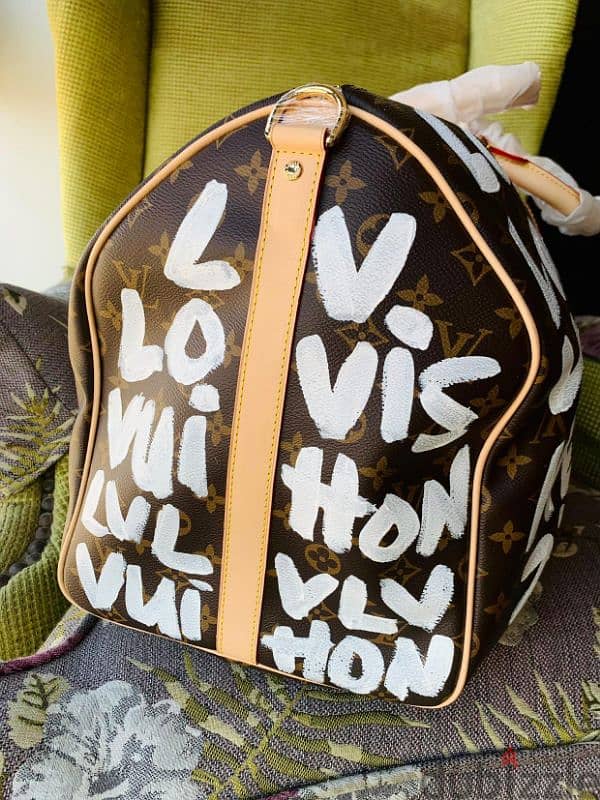 LV × Stephen sprouse Duffle bag in perfect condtion. 0