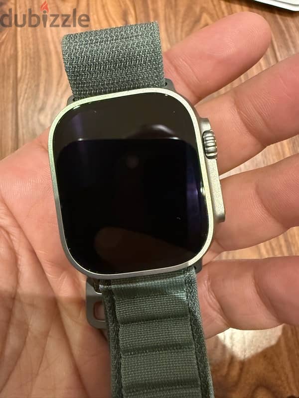 Apple watch ultra 1 with green alpine loop L 5